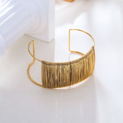 Wide gold woven bangle bracelet