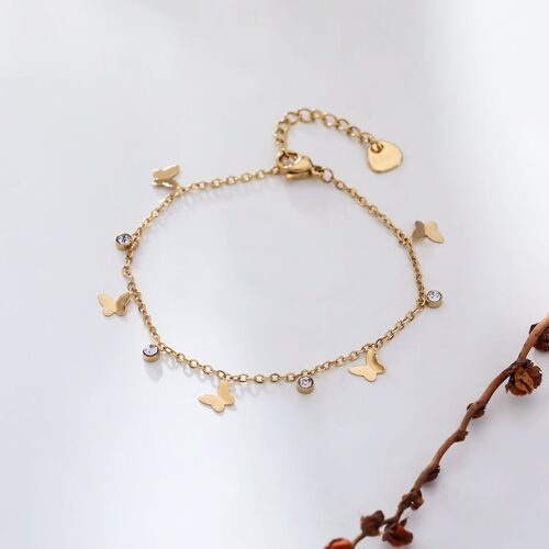 Bracelet chaîne dorée pampilles papillon et strass
