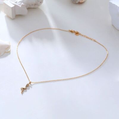Gold chain necklace with snake pendant