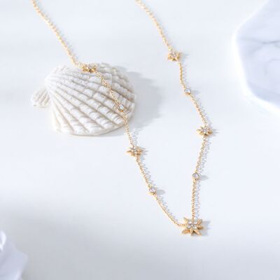 Gold chain necklace with stars and rhinestones