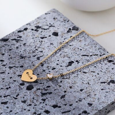 Gold chain necklace with heart pendant and rhinestones