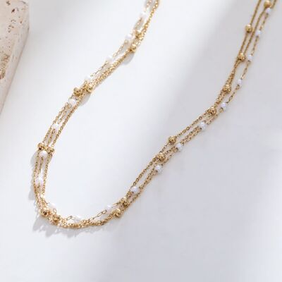 Gold multi chain necklace with pearls and balls