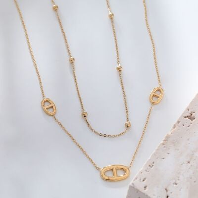 Double chain necklace with triple rings
