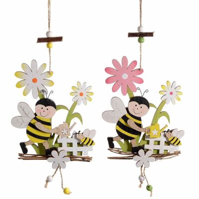 Coloridos adornos de madera con abejas y flores para colgar.