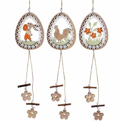 Carved wooden eggs with flower pendants to hang