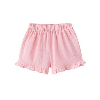 Short bébé rose avec bordure volantée 1