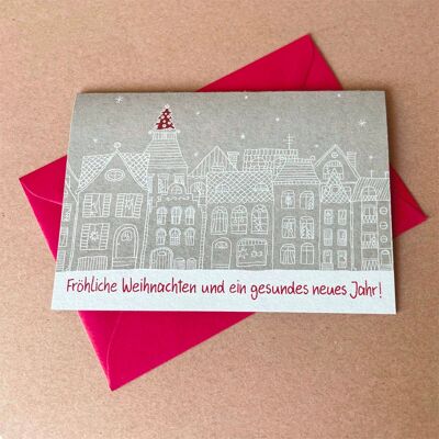 10 tarjetas navideñas grises con sobres: hilera de casas navideñas