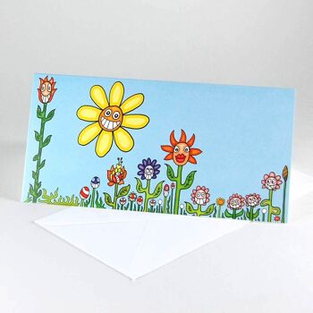 prairie de fleurs qui rit - carte de voeux de dessin animé avec enveloppe blanche 1