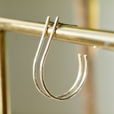 Large oval hoop earrings in silver