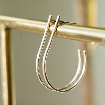Large oval hoop earrings in silver