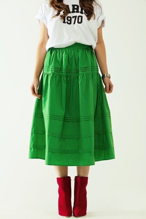 Falda midi de popelina escalonada con detalles de costuras en verde