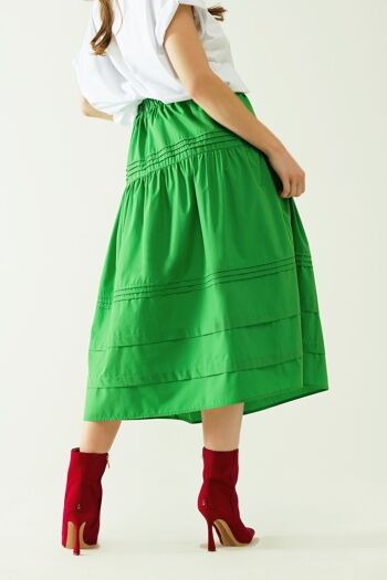 Falda midi de papelina escalonada avec détails de costumes en vert 2