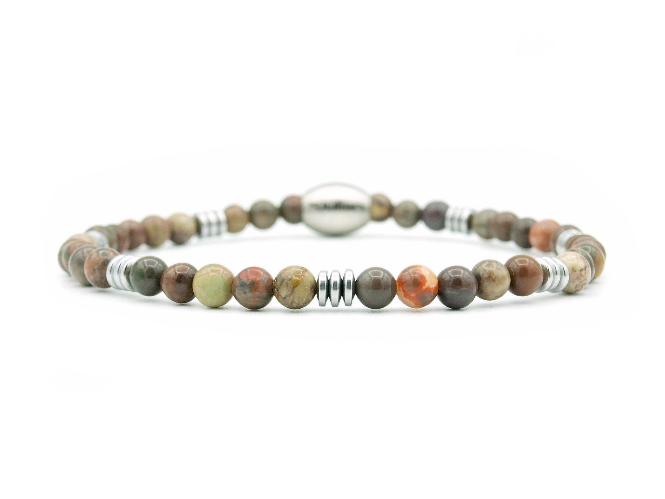 Empat batu Couleur jaspe (argent ou or)