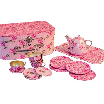 Service à thé dans une valise à motifs de fleurs roses