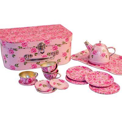 Juego de té en maleta con motivos de flores rosas.