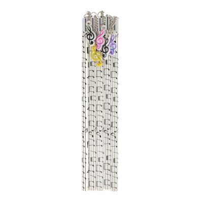 Pencils in white with black musical lines and colorful treble clef pendants