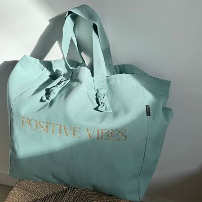 “Positive Vibes” tote bag in Caribbean Blue