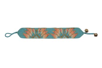 Bracelet perlé feuille de lotus aqua et pêche 1