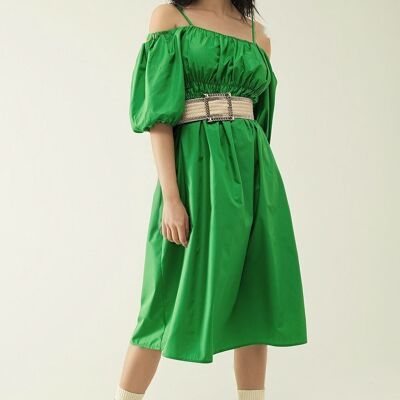 Vestido midi verde con manga corto e tirantes.