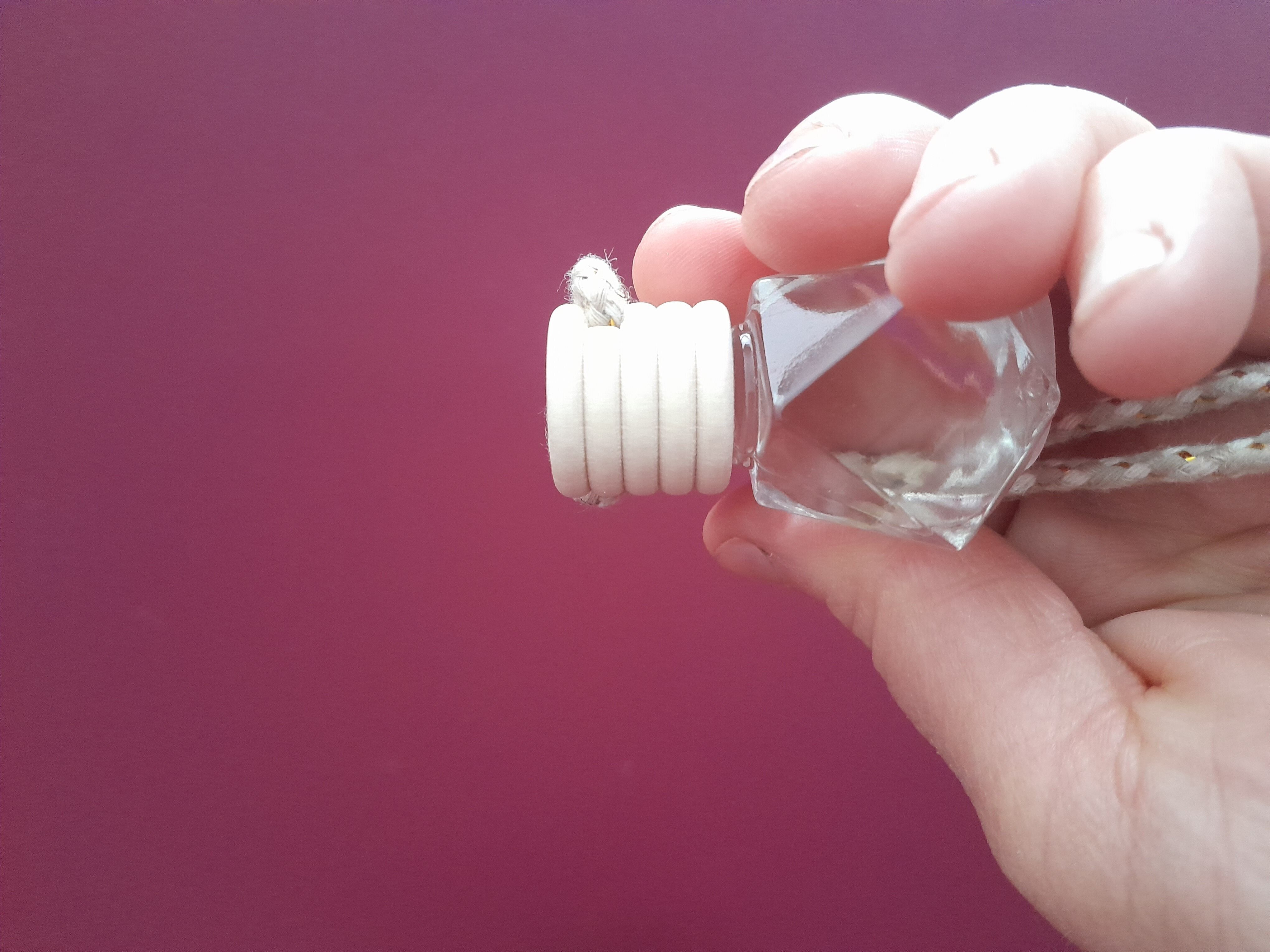 Difusor de coche de flores de algodón.