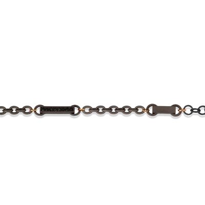 Bracelet  made in titanium, 8 black diamonds  and chain ,red gold 9 kt and 18 kt.-l