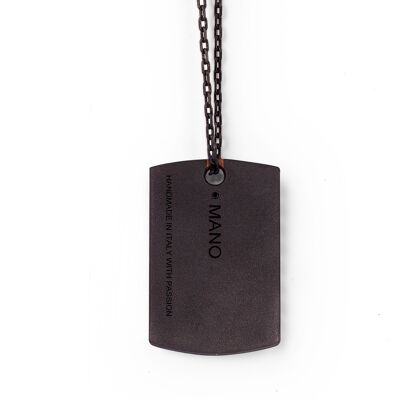 Tag made in titanium, red gold 18 kt, 30 black diamonds , red gold 9 kt and chain.-