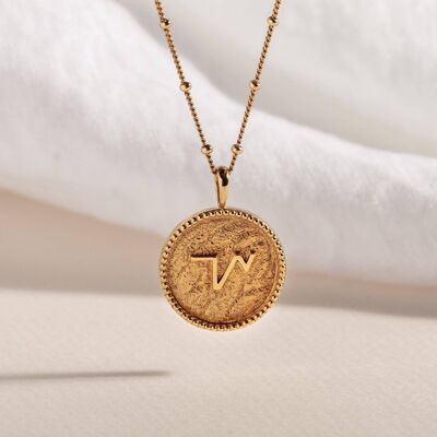 Collana con moneta d'oro abbreviata "Thrive".