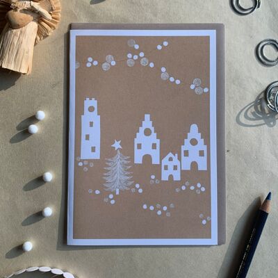 Cartolina di Natale città d'inverno