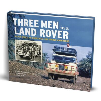 Drei Männer in einem Land Rover