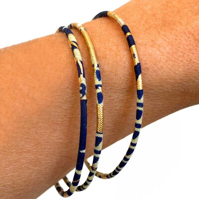 Fine bracelets in navy blue and gold wax