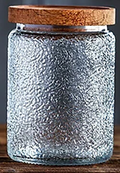 Embossed glass storage container with airtight bamboo lid. Dimension: 10x14cm Capacity: 700ml LM-321A3