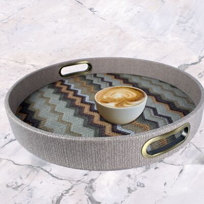 Round brown tray with zigzag pattern with brass handles