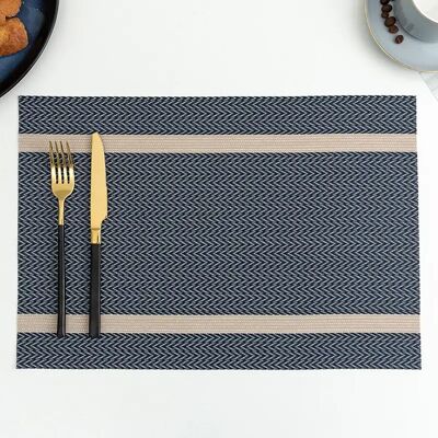 Set de table bleu antidérapant et imperméable avec bande horizontale dorée. Dimension : 45x30cm LM-336B