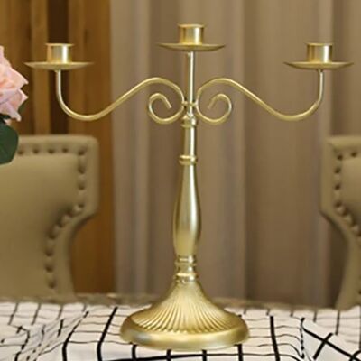 Metal retro triple decorative candle holder in gold color. Dimension: 13x32x30cm SD-177