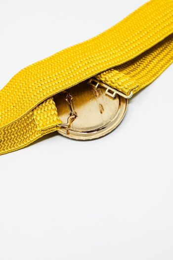 Cinturón tejido amarillo con hebilla redonda con pedrería 3