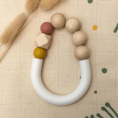 Baby teething ring in silicone and terra-cotta and yellow wood