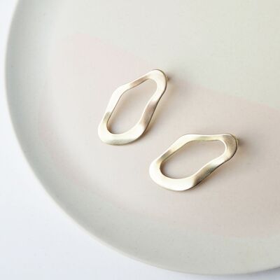 Pool Statement Stud Earrings-Wavy sculptural statement gold tone stud earrings.