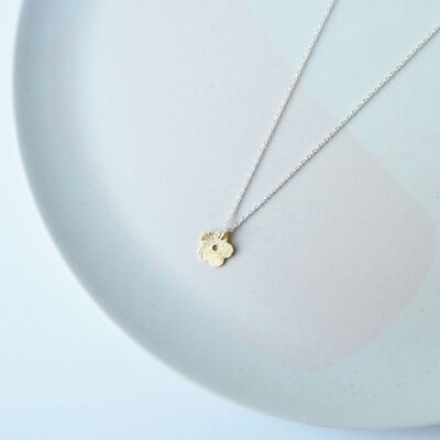 Minima Silver Necklace-Sterling silver necklace with gold toned flower charm.