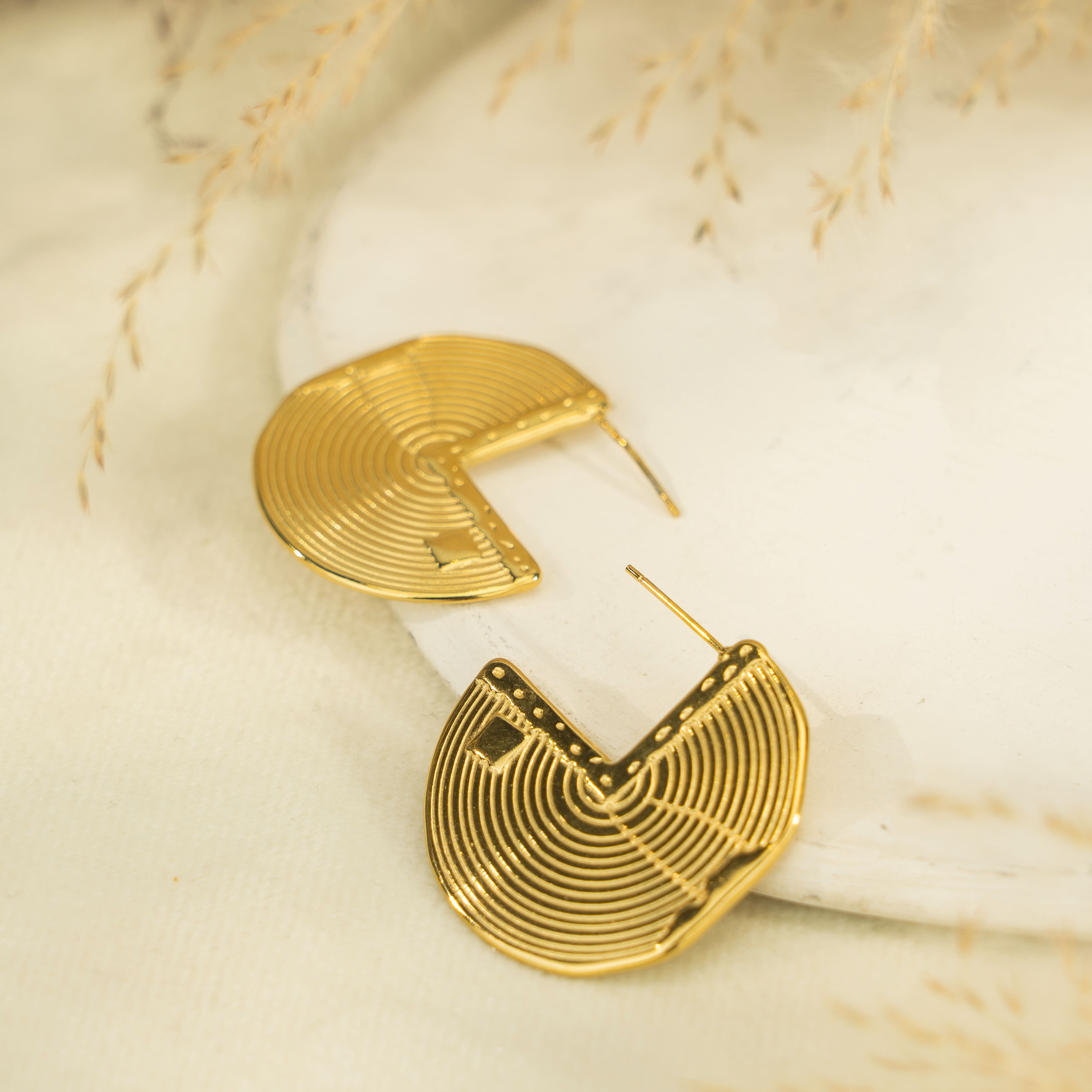 Boucles d'oreilles disque coupé