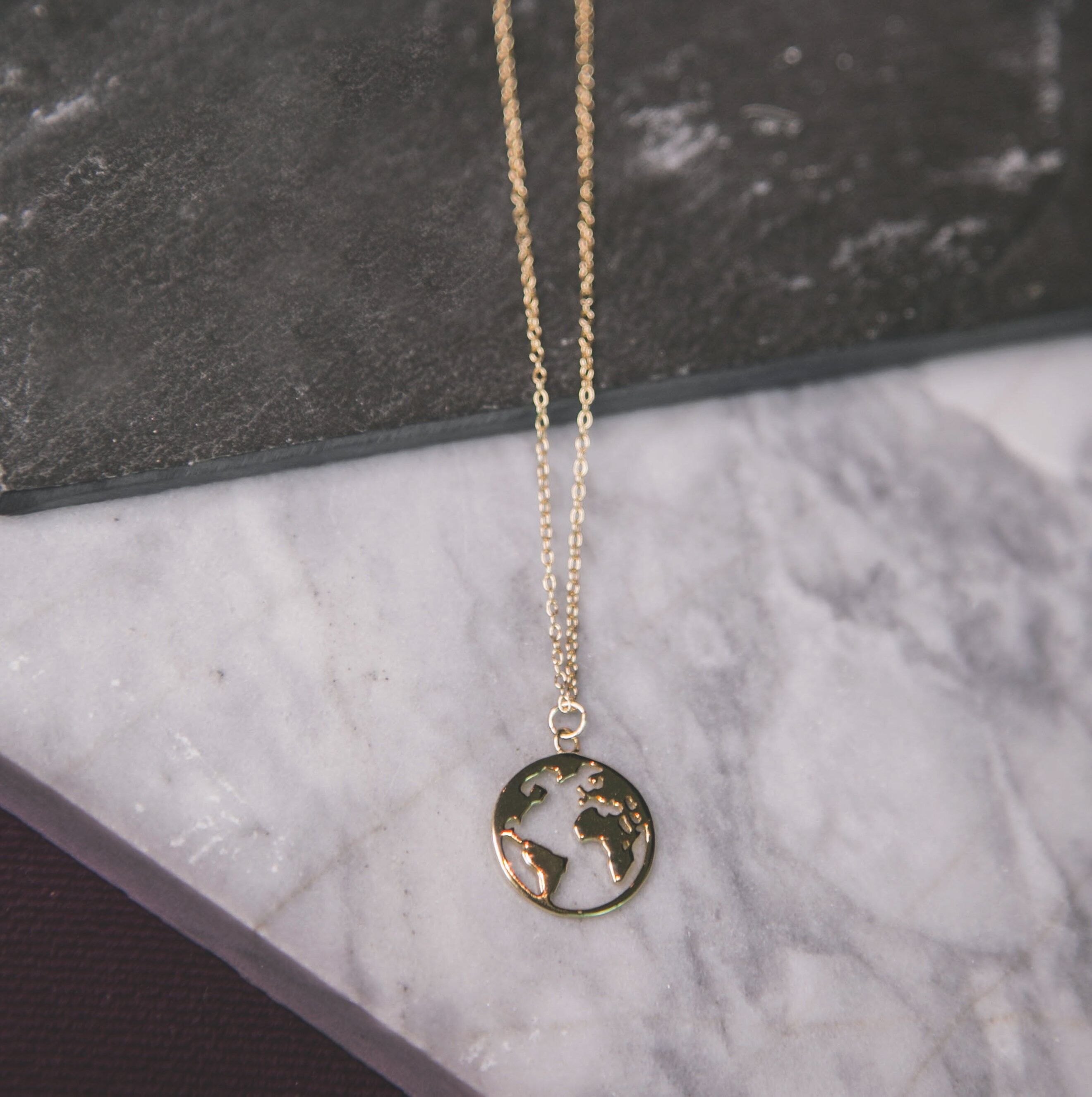Collana Petra Coin con mappa del mondo - Oro