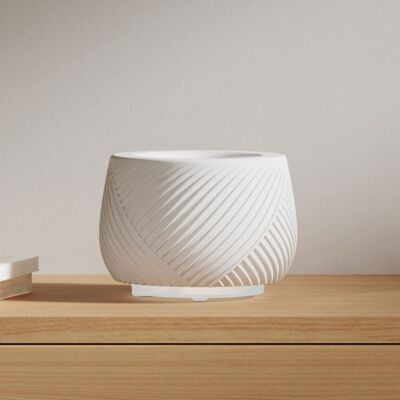 Serelia: Ceramic diffuser of essential oils using gentle heat. Sleek and modern