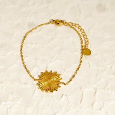 Golden chain bracelet with sun pendant