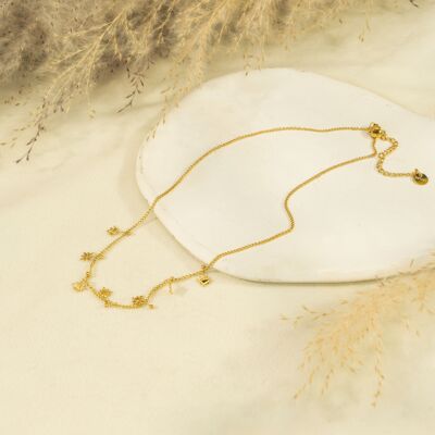 Gold chain necklace with star pendants