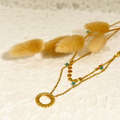 Double golden chain necklace with sun and green stone pendant