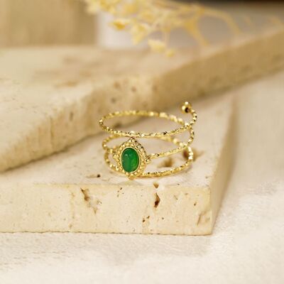 Anello multicerchio in oro con pietra verde