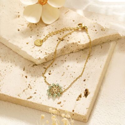 Golden chain bracelet with green flower