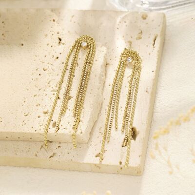 Gold dangling earrings with rhinestones