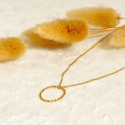 Gold chain necklace with oval pendant