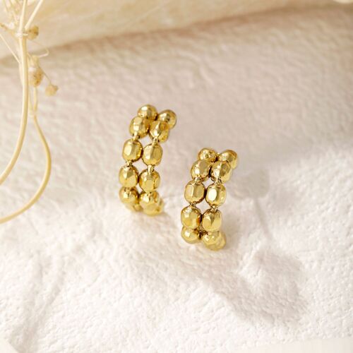 Boucles d'oreilles dorées chaînes de boules courbées