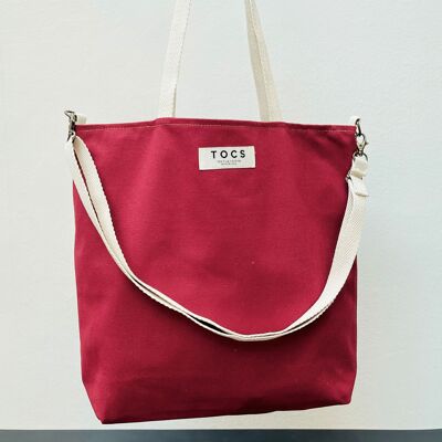 Einfache rote Tasche mit Baumwollgriffen